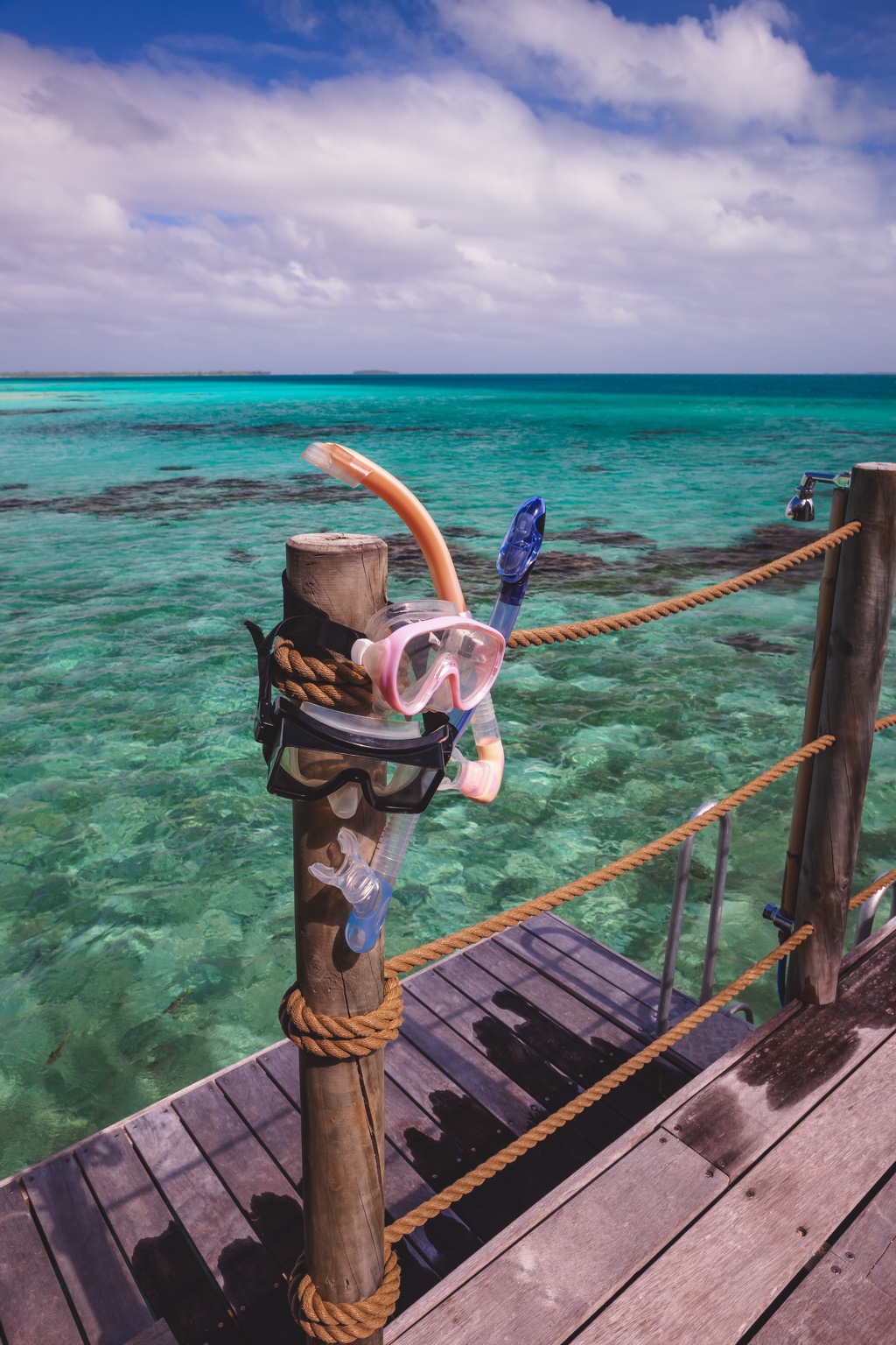 Snorkeling in clear tropical water with an underwater camera